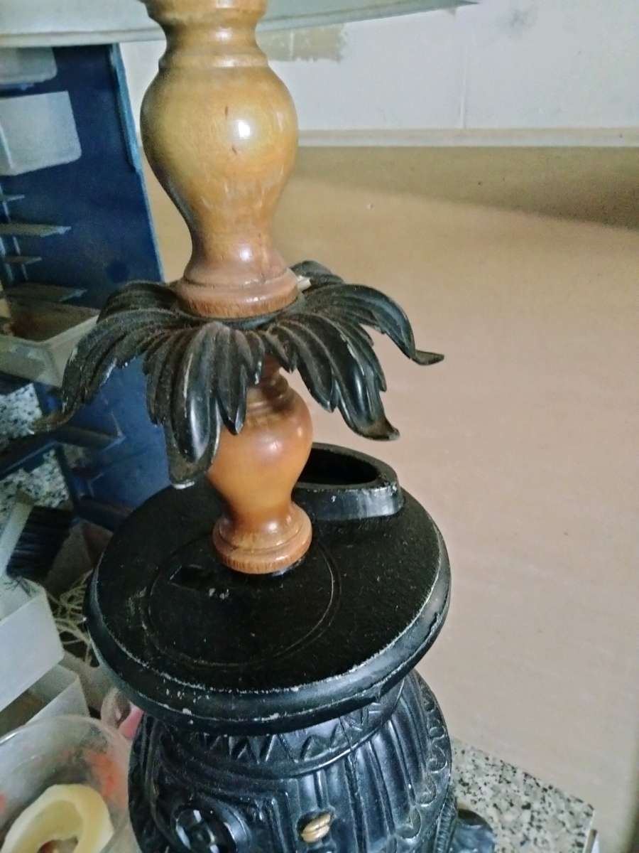 lamp with a pot belly stove base