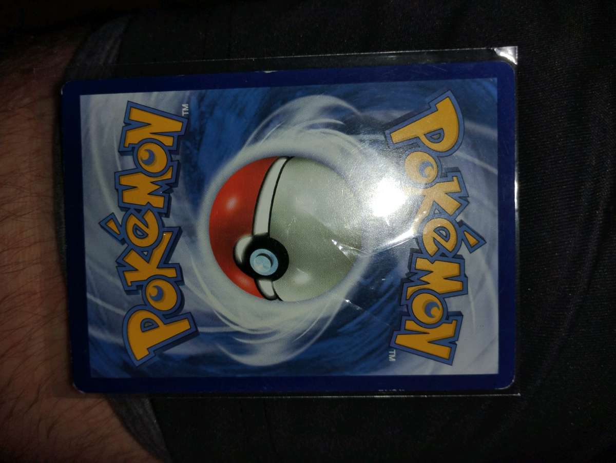 selling rare 2016 Pikachu and rare 2016 team rocket trainer