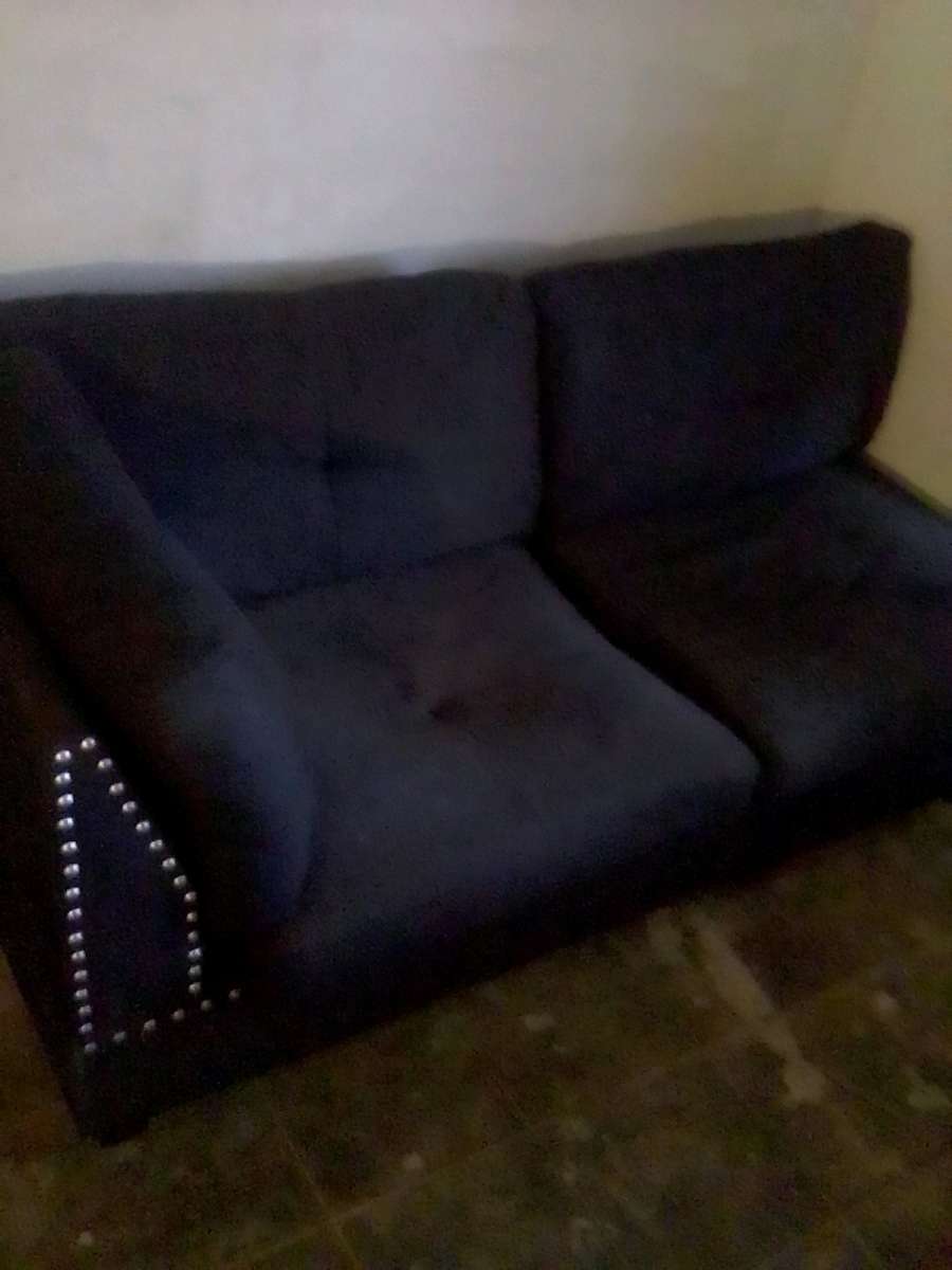 studded black contemporary couch