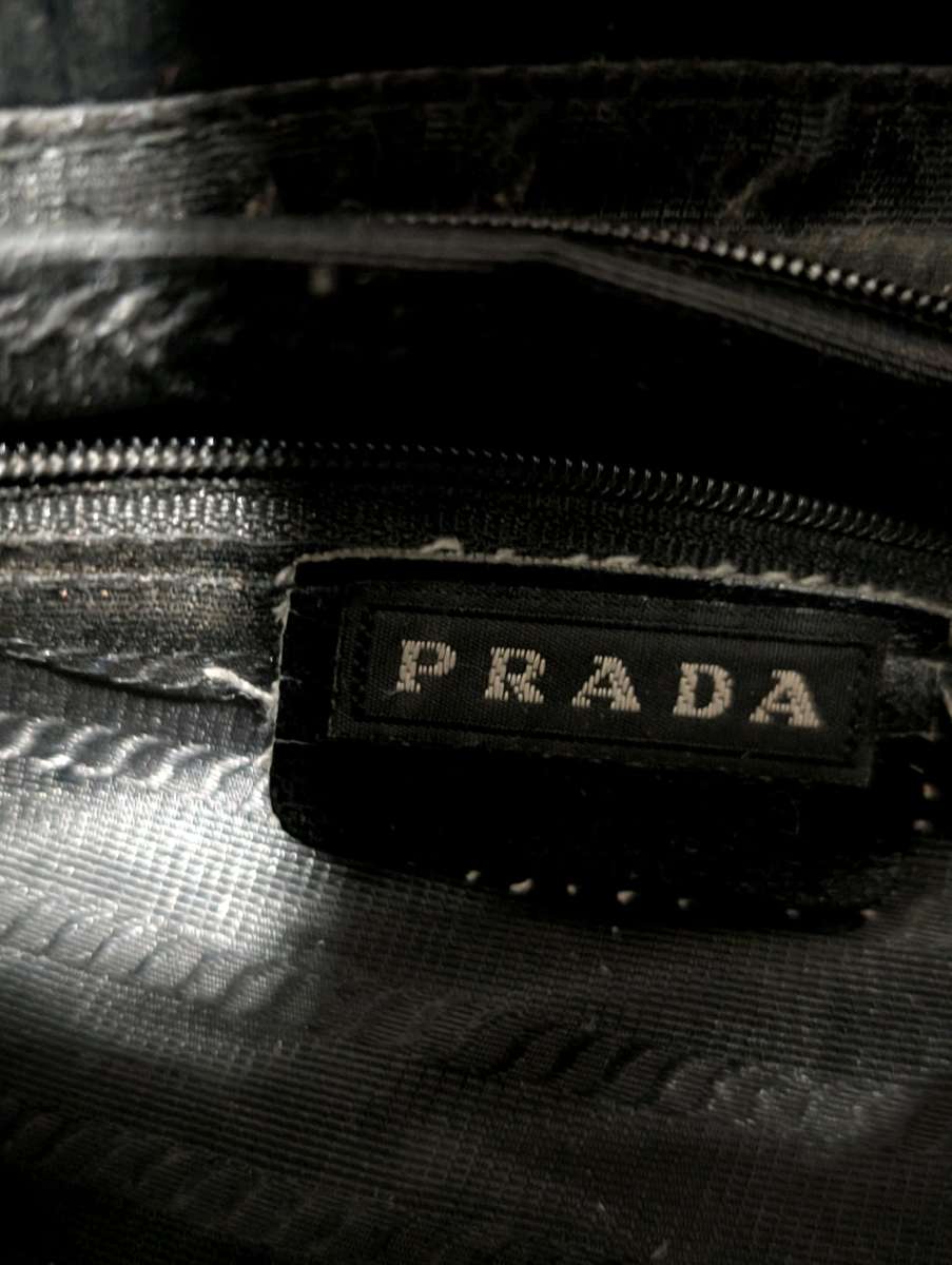 Prada Black Leather Purse with Structured Design