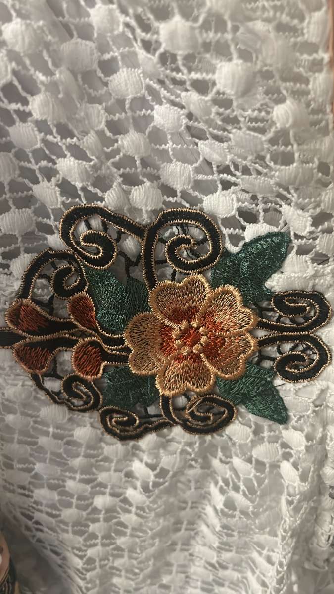 Luxxel White Embroidered Floral Romper with Bell Sleeves Siz