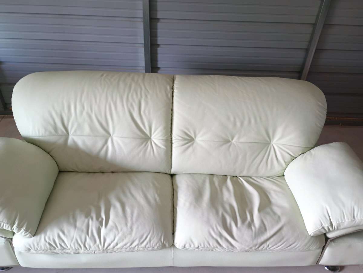 Celadon color Leather couch  FREE DELIVERY IF NEEDED
