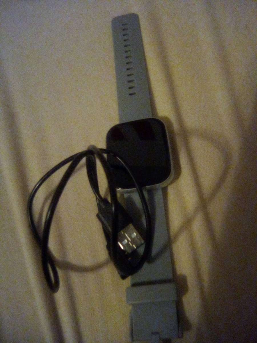 a Fitbit watch and it tells time