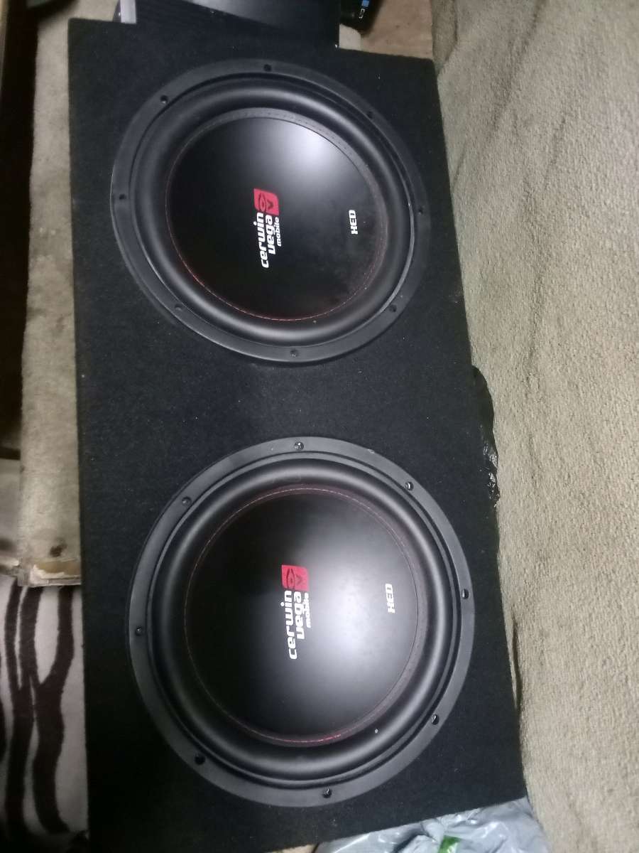 Two 12 inch Cerwin Vega subwoofers and a 1000w4 channel amp