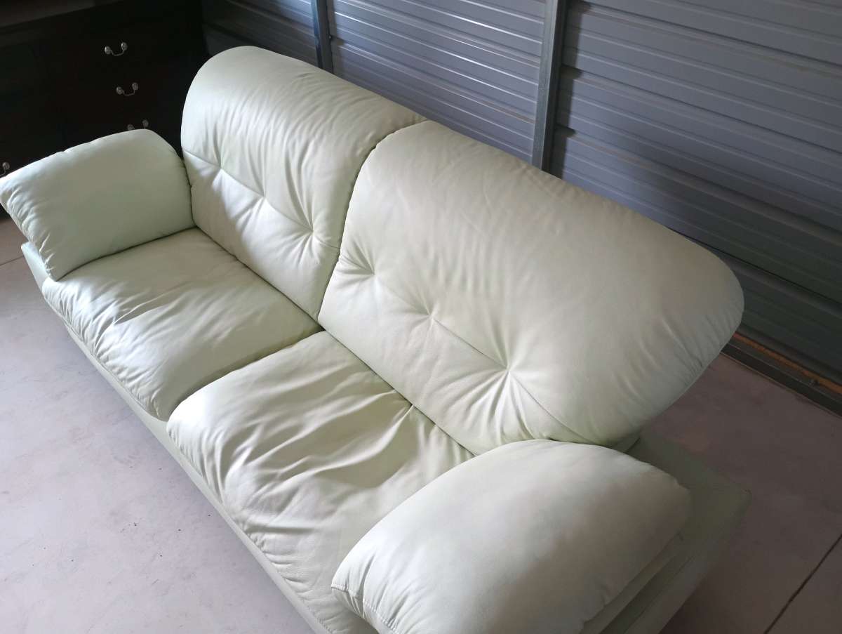 Celadon color Leather couch  FREE DELIVERY IF NEEDED