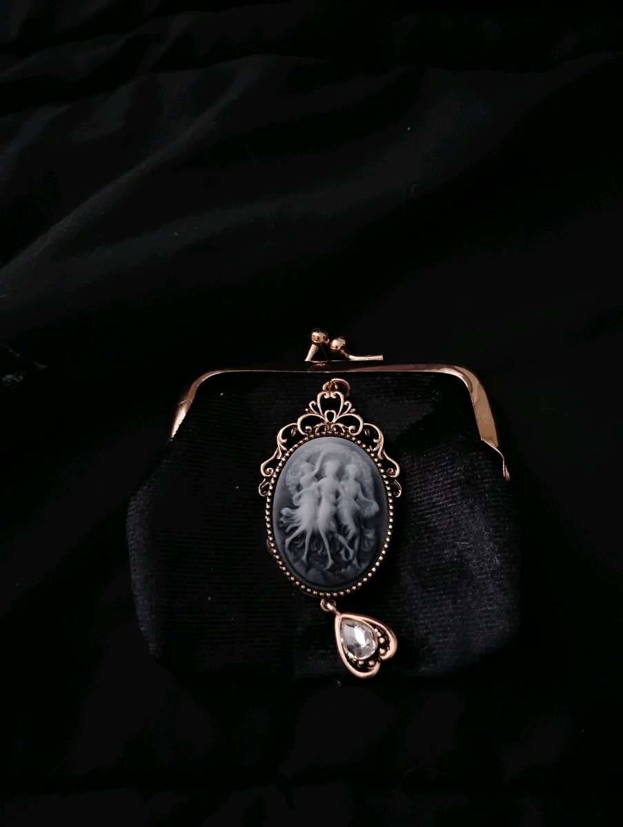 Black and gold money pouche