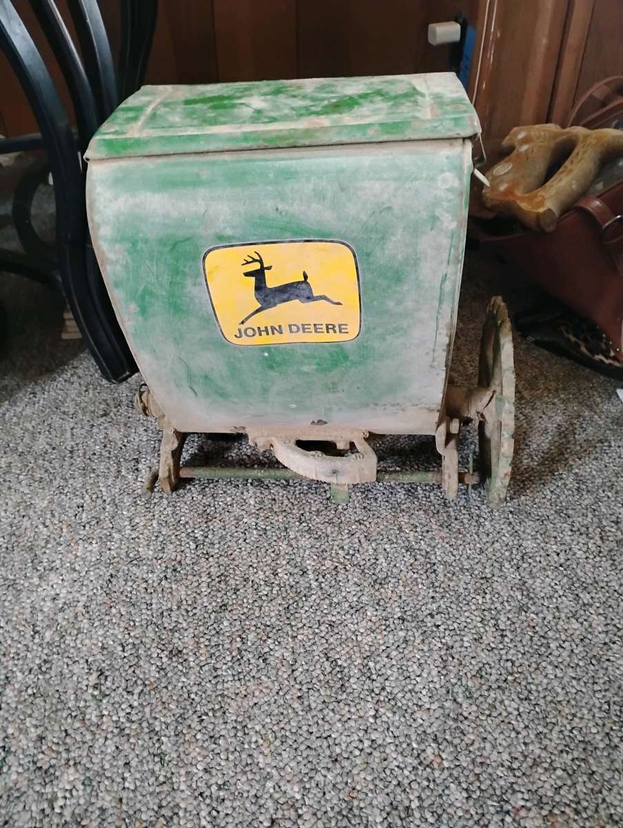 2 vintage John Deere planters