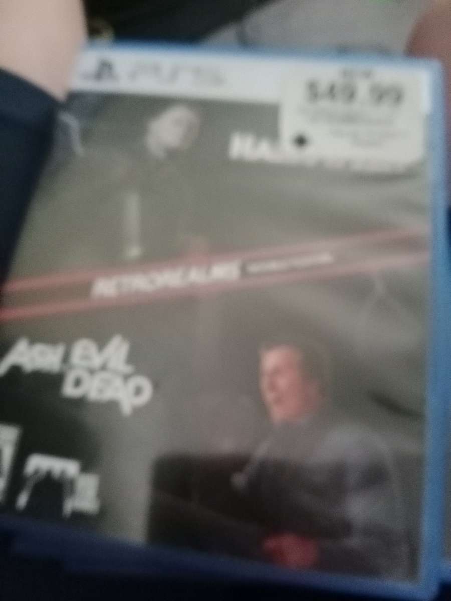 ps5 with 1 controller and 3 games