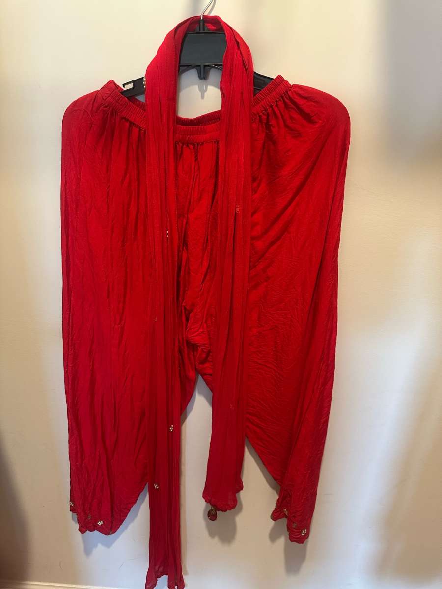 complete dress set in bright red color with all border work