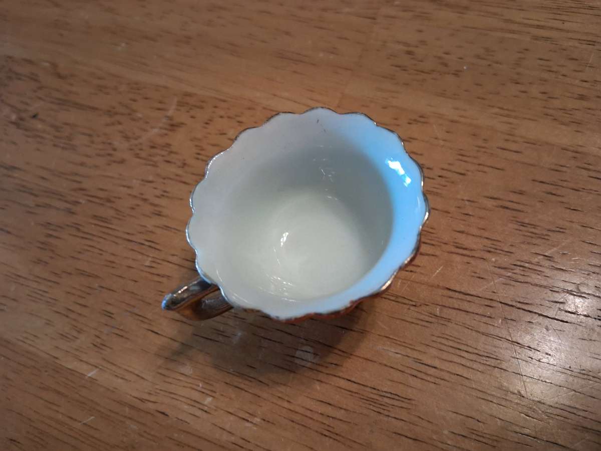 orange and pink flower design tiny teacup