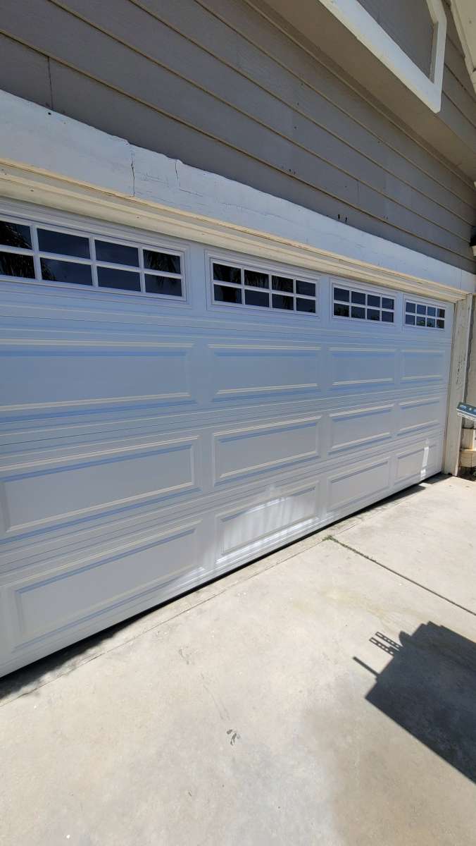 NEW GARAGE DOORS