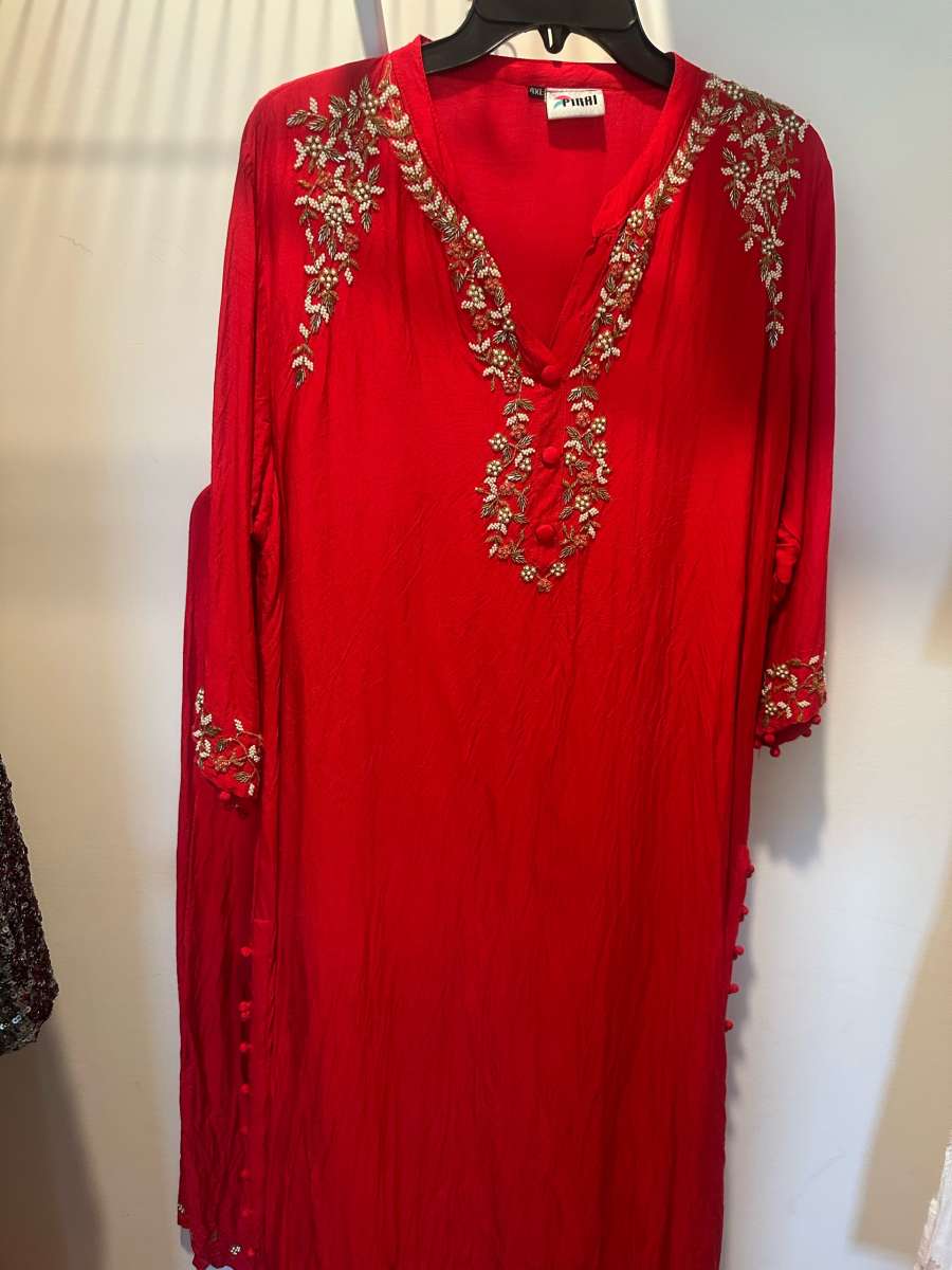 complete dress set in bright red color with all border work