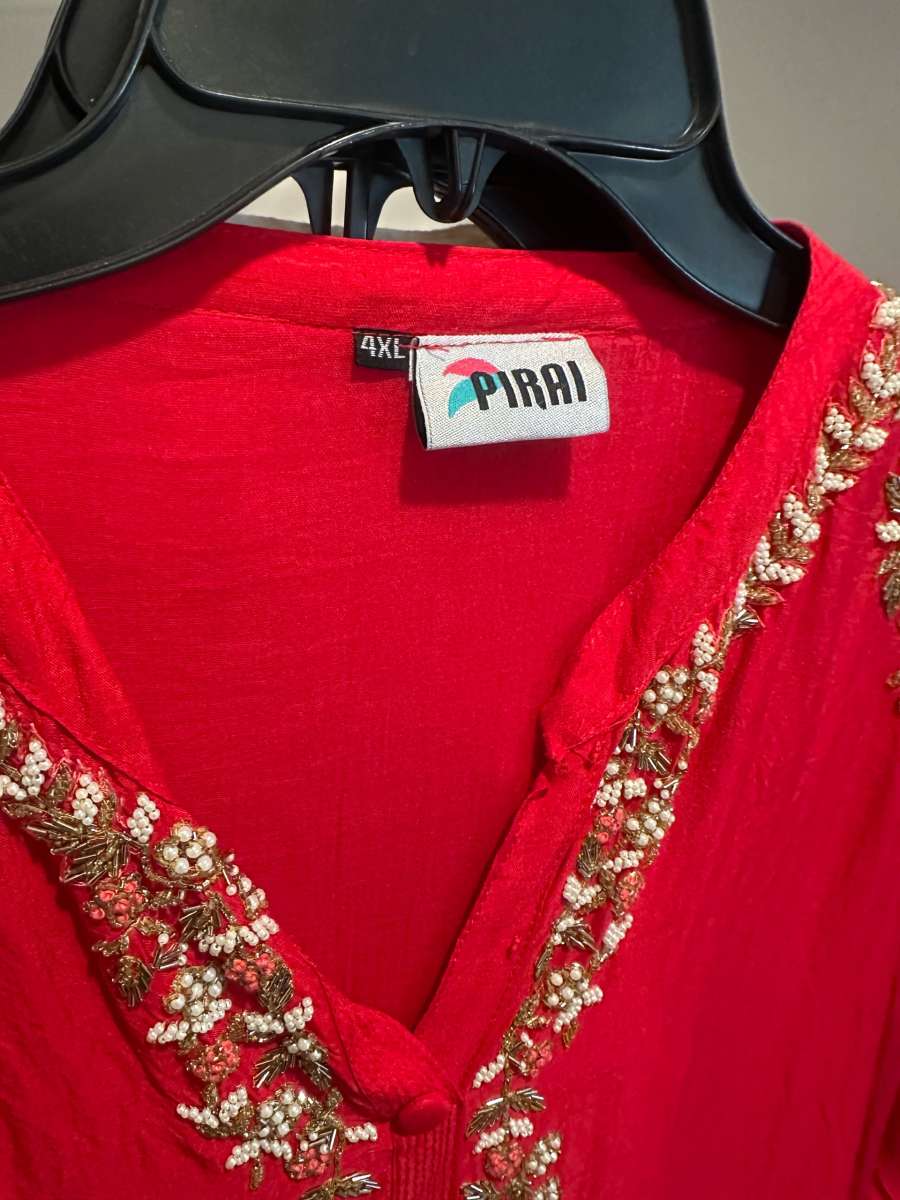 complete dress set in bright red color with all border work