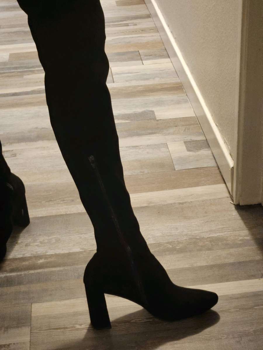 black thigh high leather boots