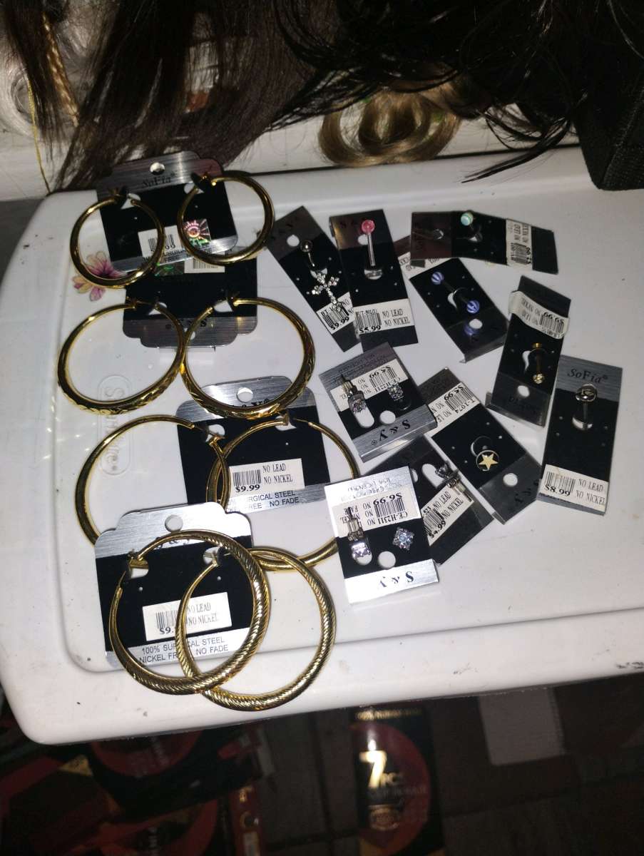 earrings tongue rings and belly button piercings