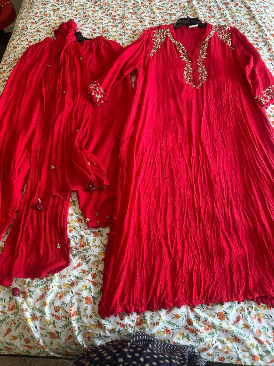 complete dress set in bright red color with all border work