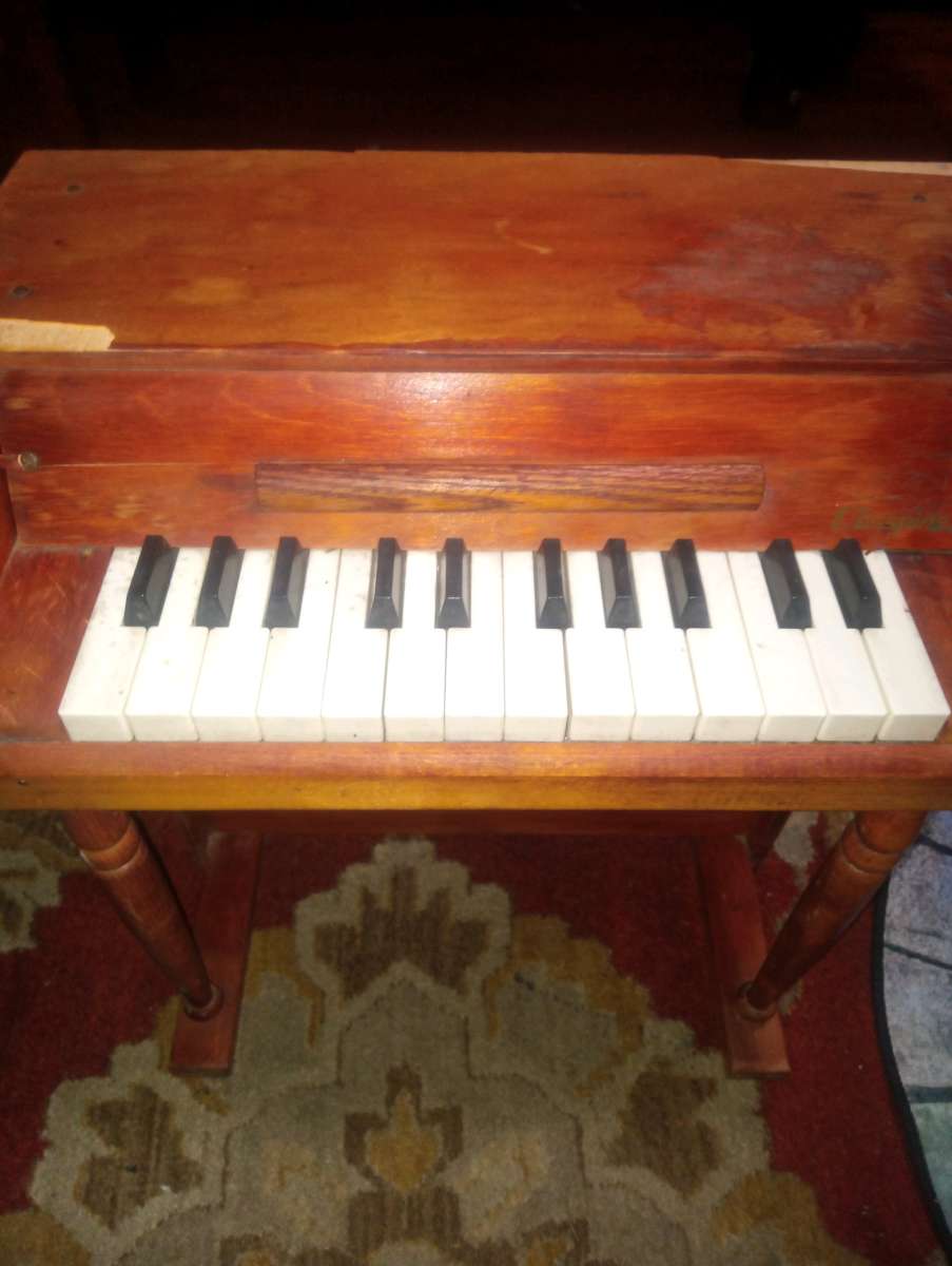 small antique vintage piano