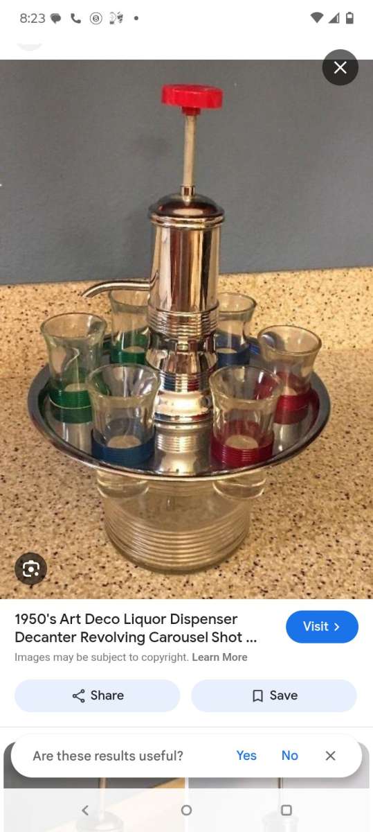1950 liquor dispenser with shot glasses