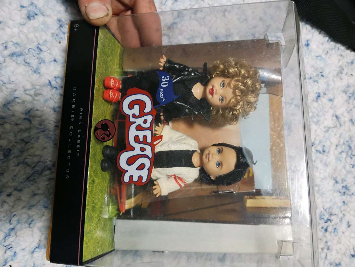 30 year of the movie Grease featuring Sandy and Danny dolls