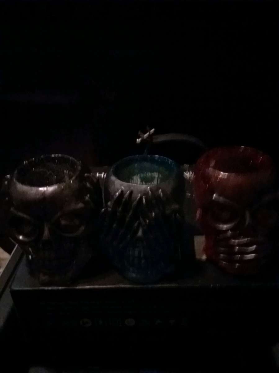 4 different sets of hear see or speak evil candle holders