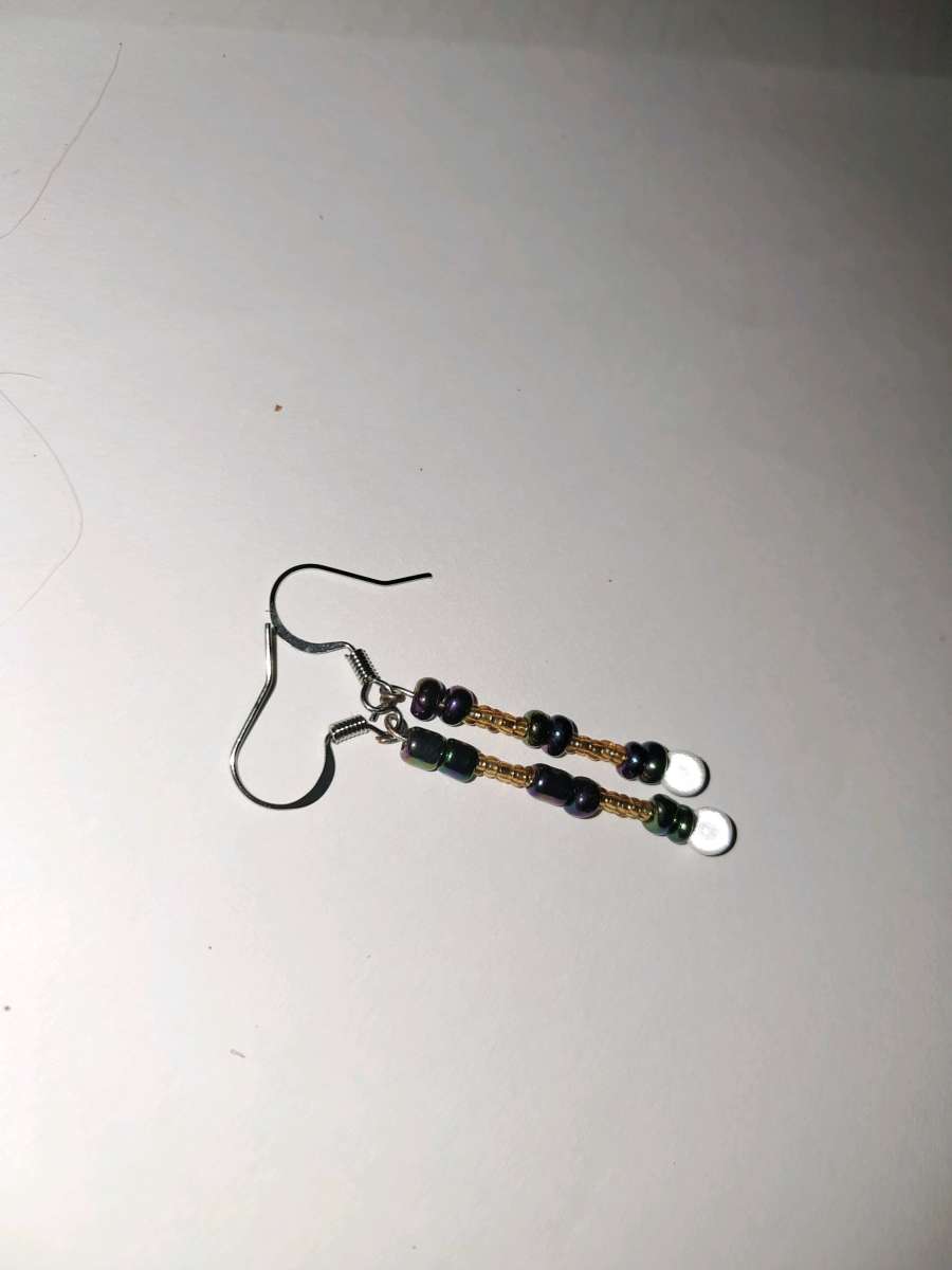 gold and purple earrings