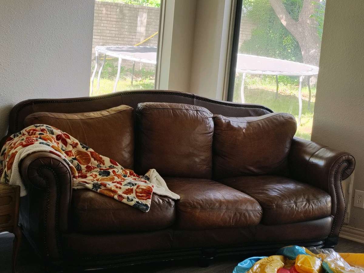 Rustic Brown leather couch and chair