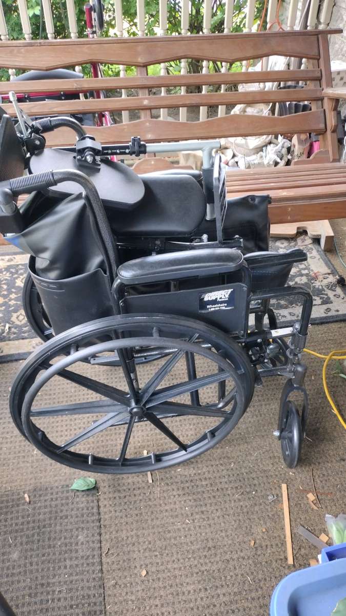 a brand new wheelchair never used that has the foot rest
