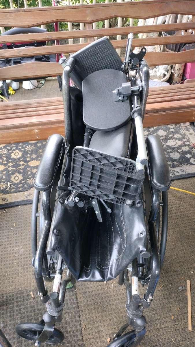 a brand new wheelchair never used that has the foot rest