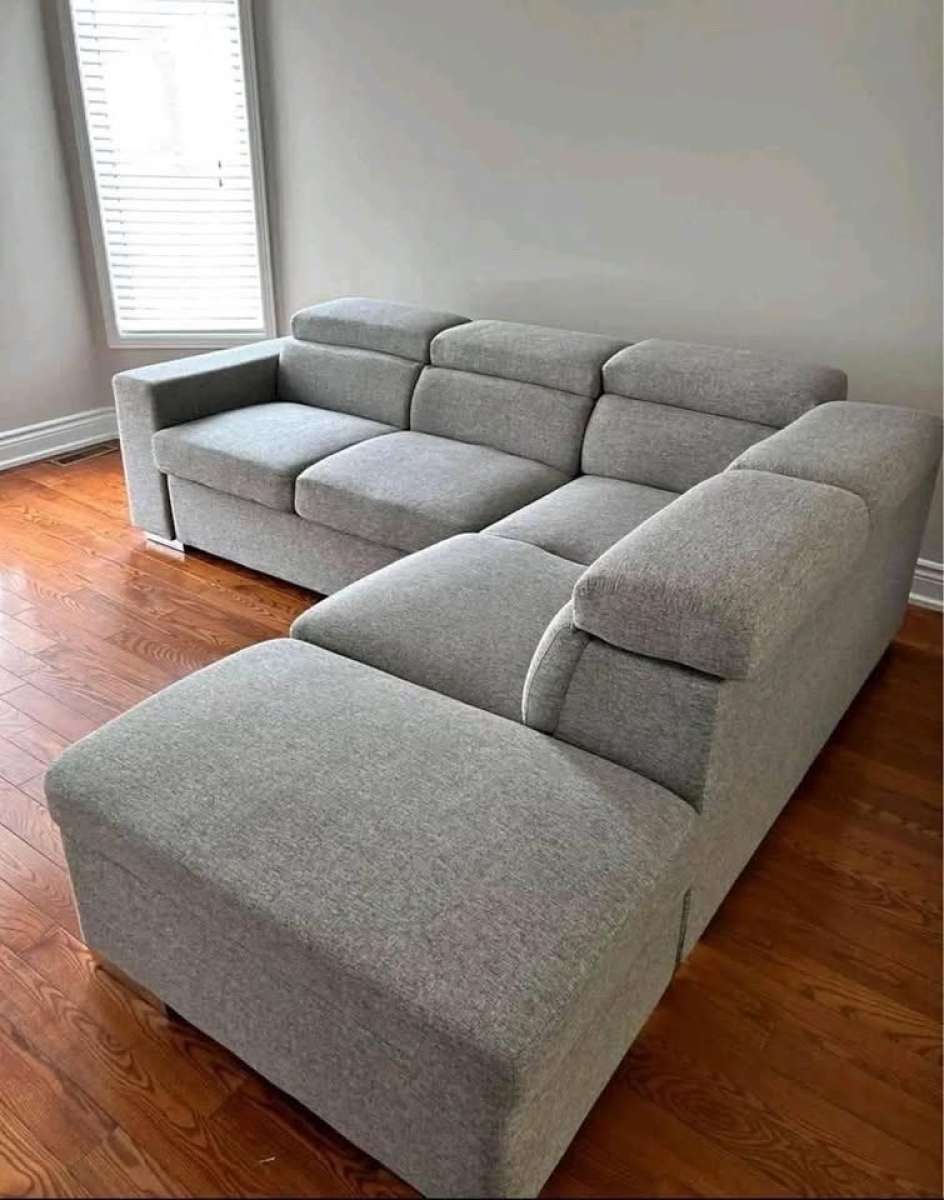 Grey Sectional sofa with pull out bed