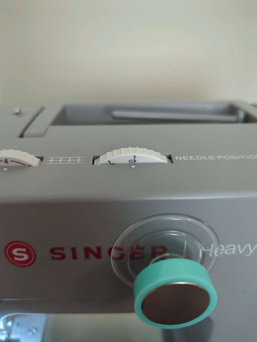 heavy duty Singer sewing machine with table extension