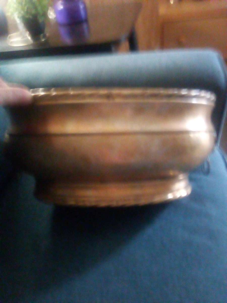 An Antique brass planter