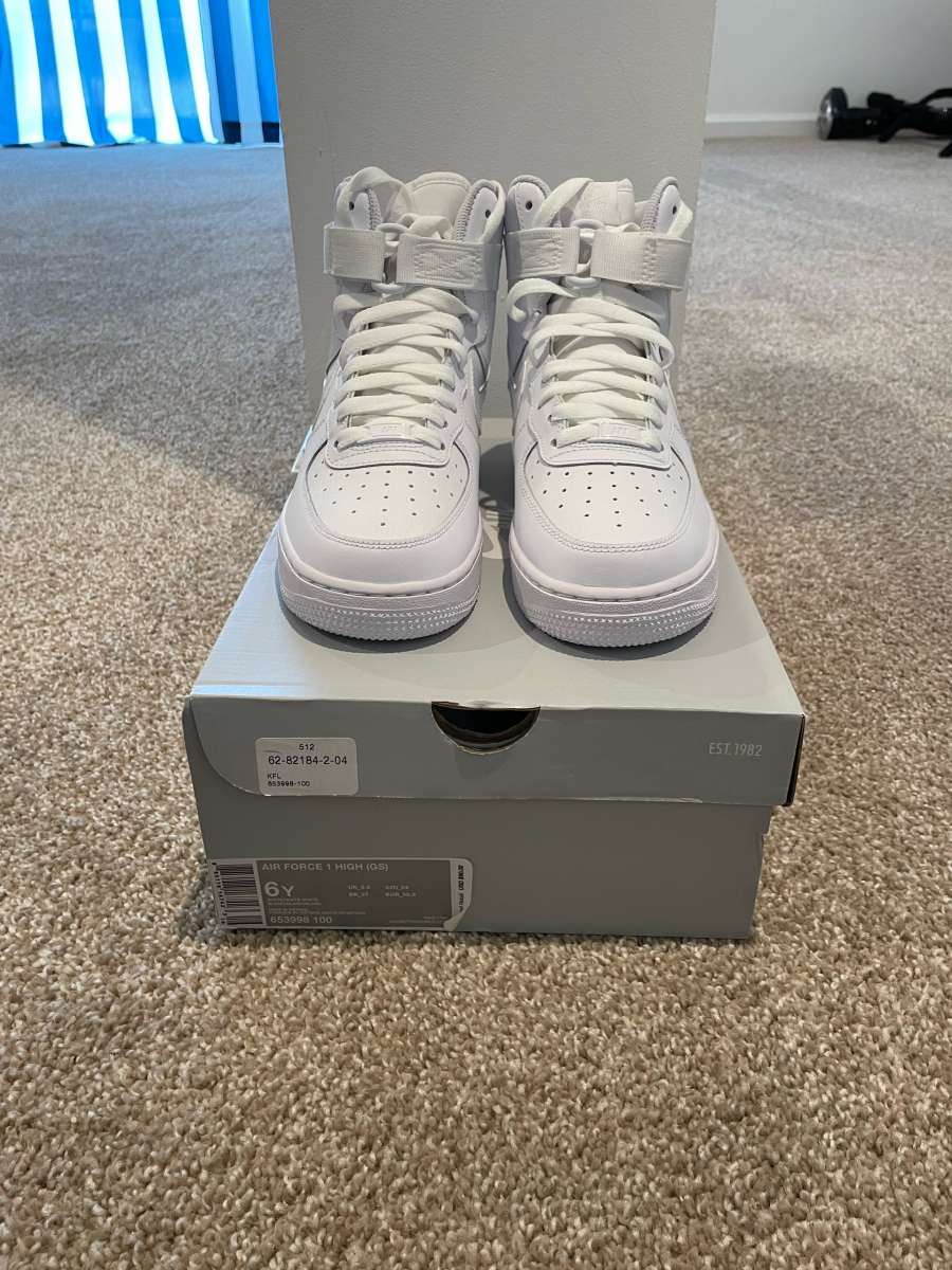icy white Air Force 1s high