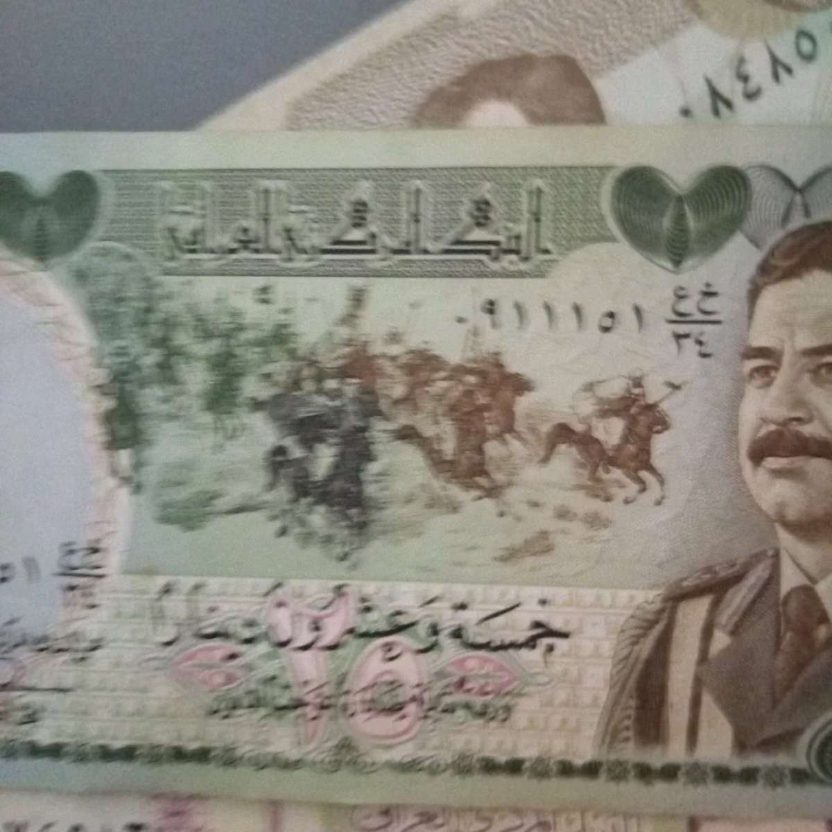 a large lot of Iraqi war currency  1980 to 1991