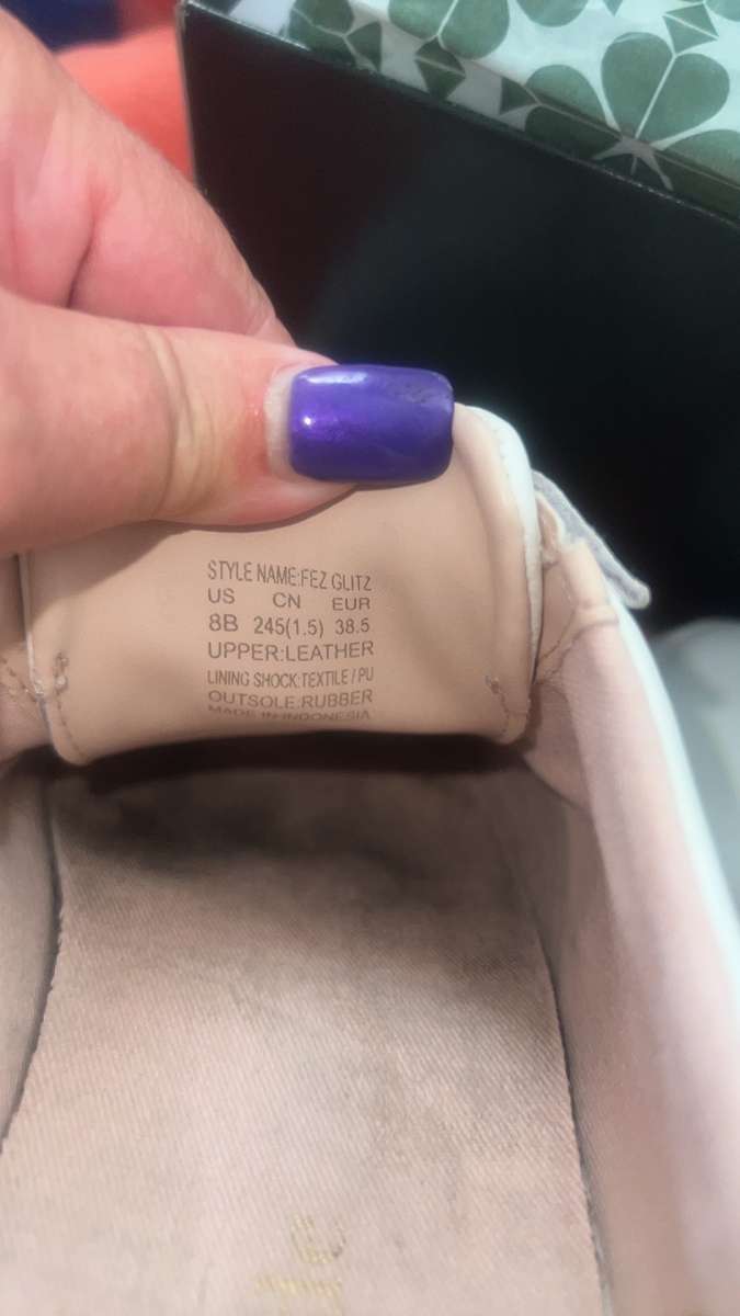 Kate Spade white leather shoes with black spade accent size