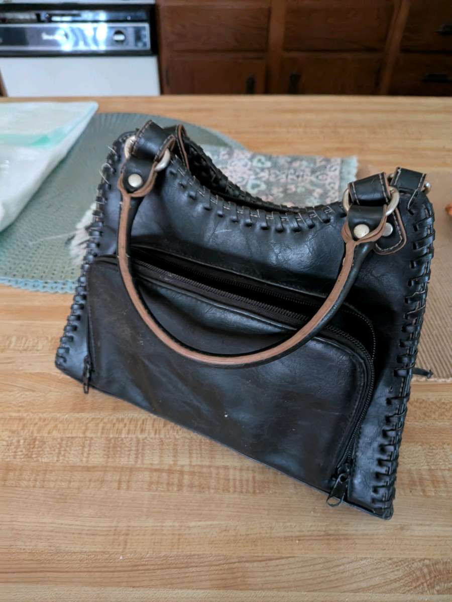 black leather clutch handbag