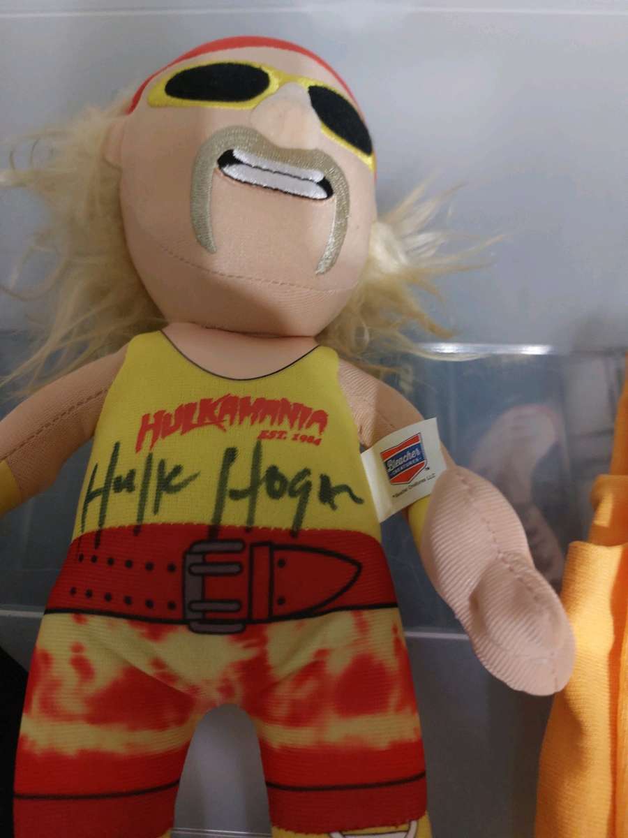 autograph red and yellow Hulk Hogan plushie