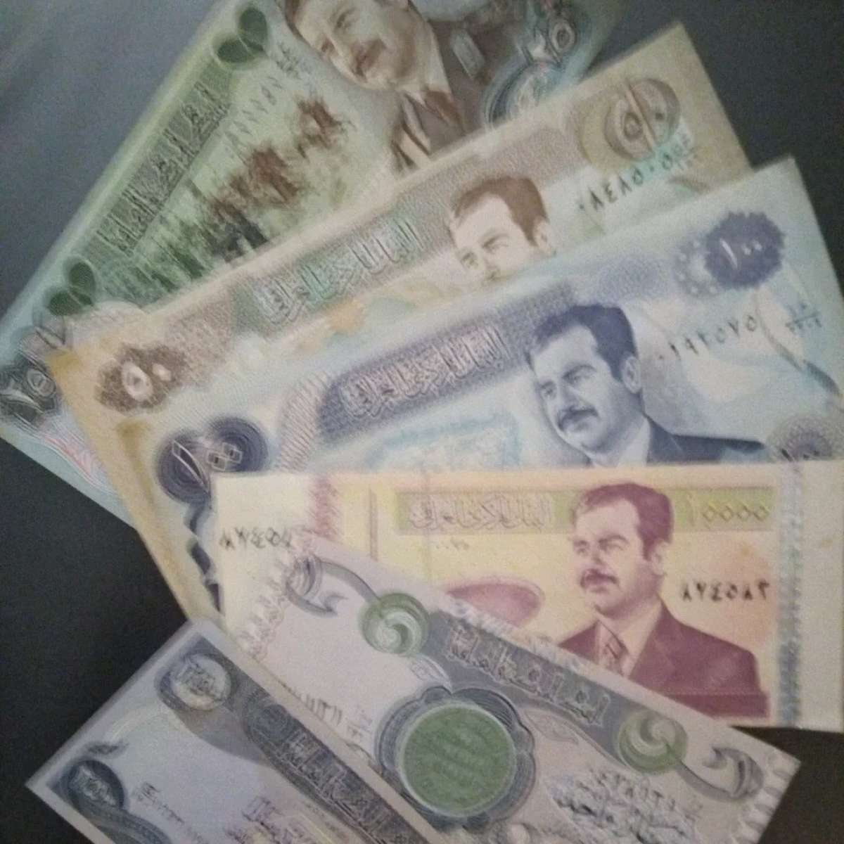 a large lot of Iraqi war currency  1980 to 1991
