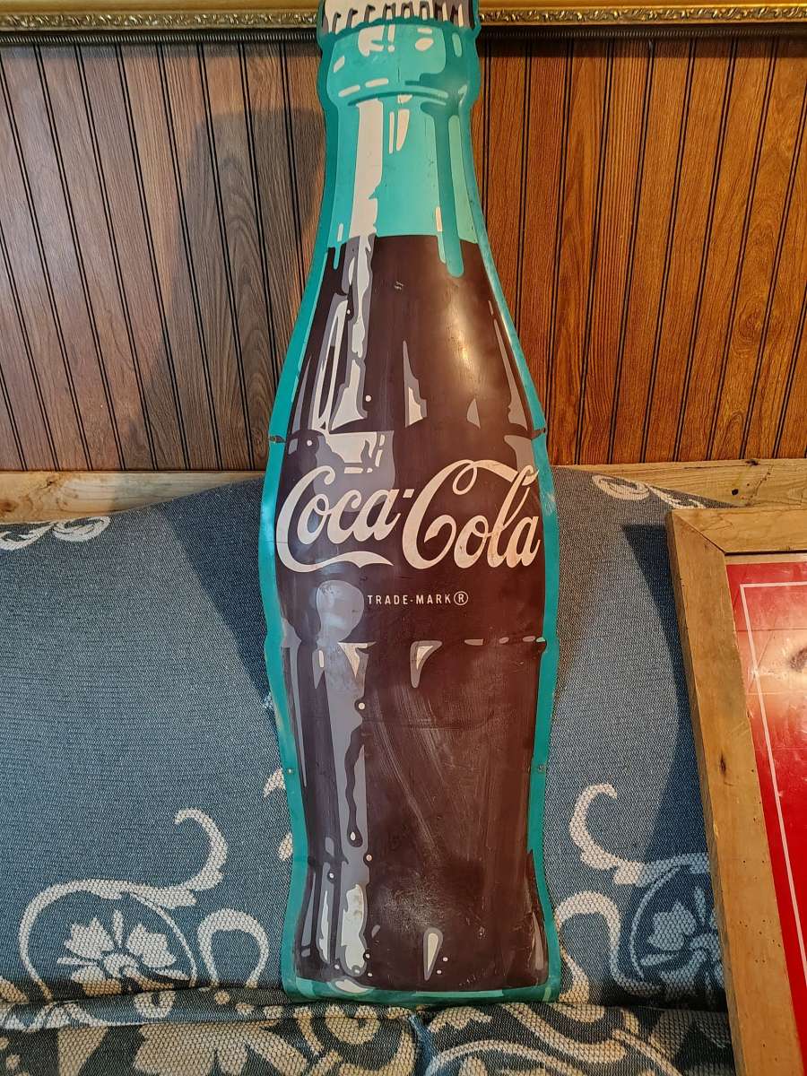 vintage Coca Cola bottle shaped die cut sign