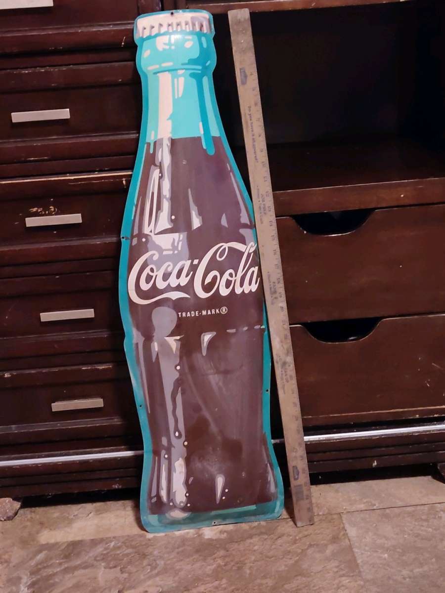 vintage Coca Cola bottle shaped die cut sign
