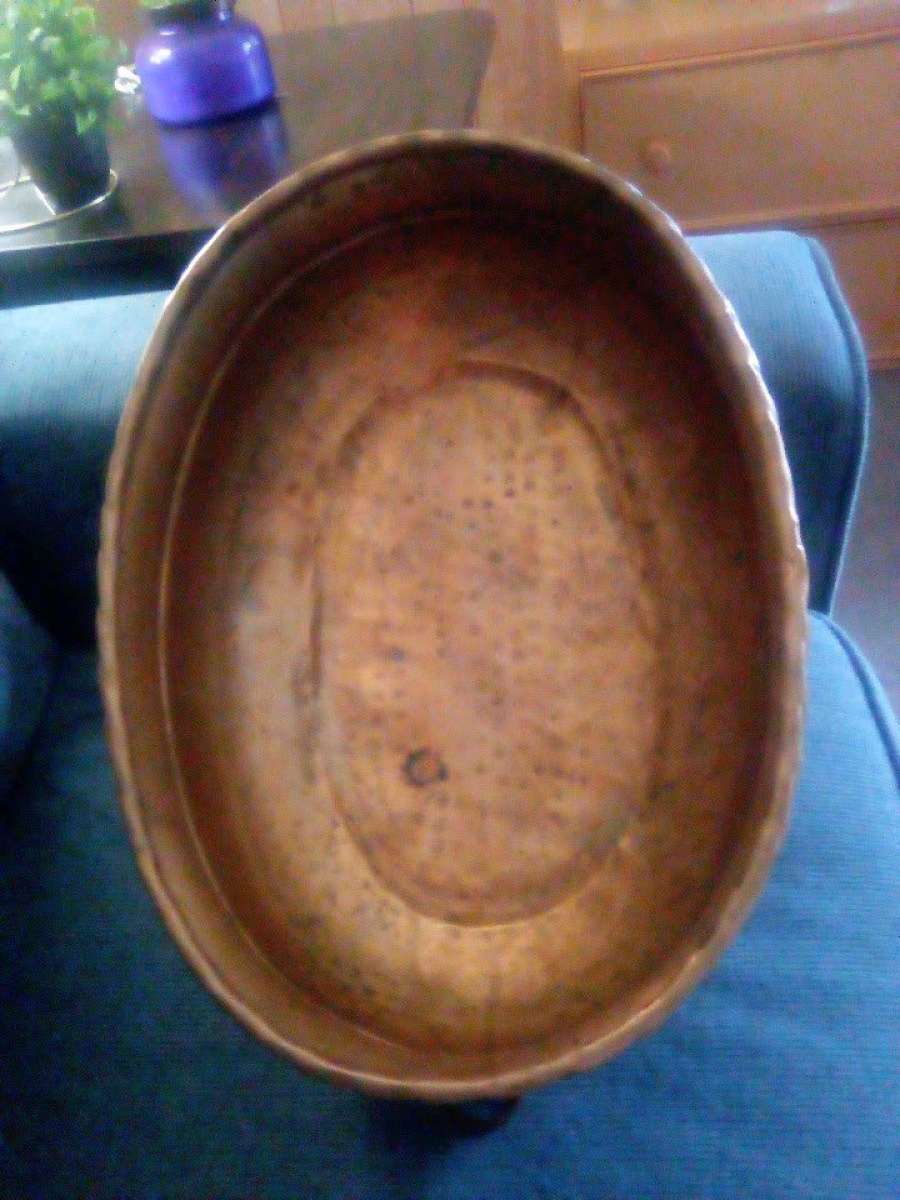 An Antique brass planter