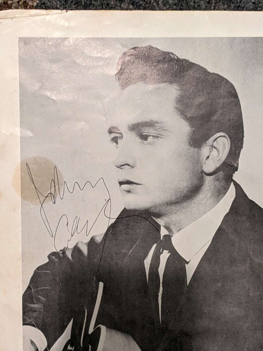 autographed by Johnny Cash on stage flyer