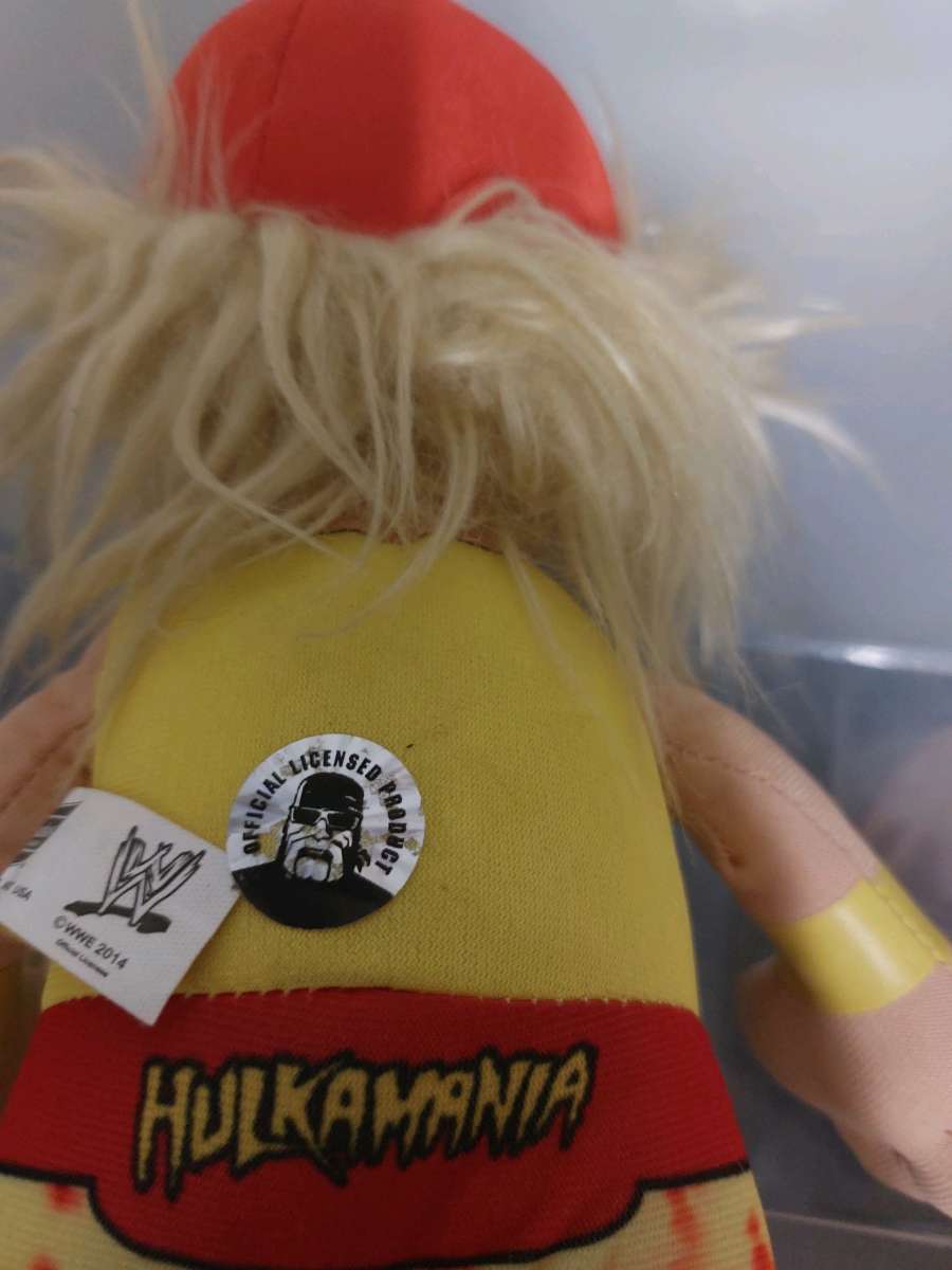 autograph red and yellow Hulk Hogan plushie