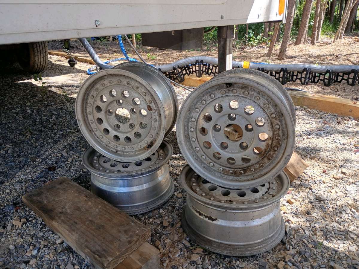 4 5 lug aluminum rims bullet hole