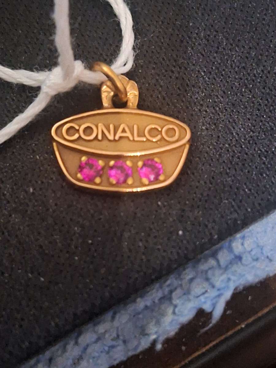 10K pendant  1 point 4 grams