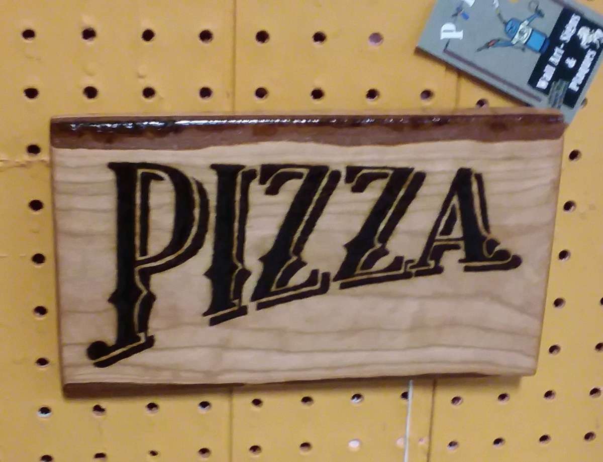 Pizza sign pyrography
