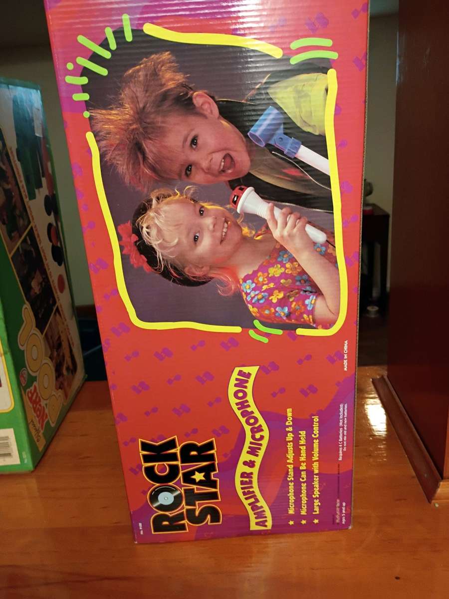 Vintage Rockstar Amplifier And Microphone