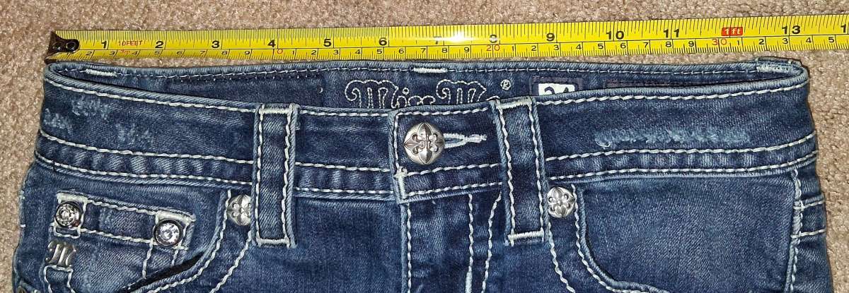 MISS ME SKINNY JEANS WITH EMBROIDED FEATHERS SIZE 24