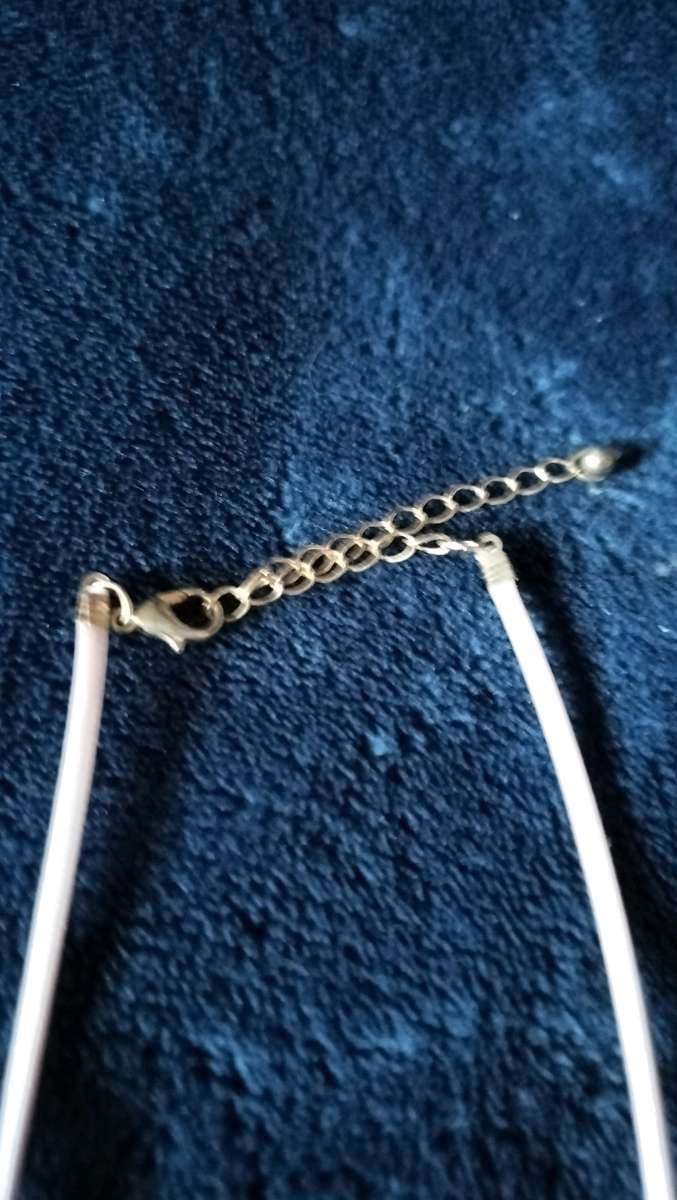 Two choker necklaces and a silver bracelet