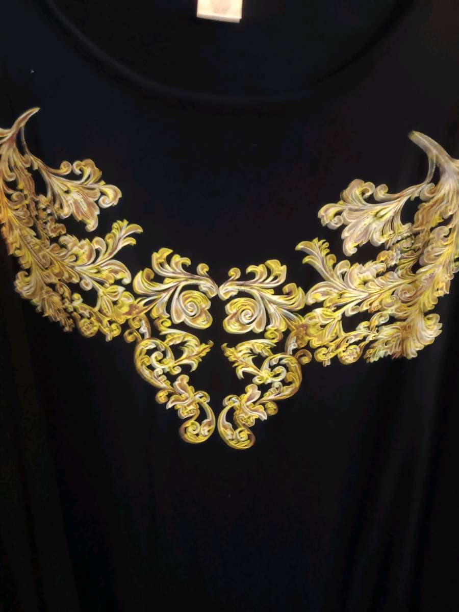 Black with gold design tunic