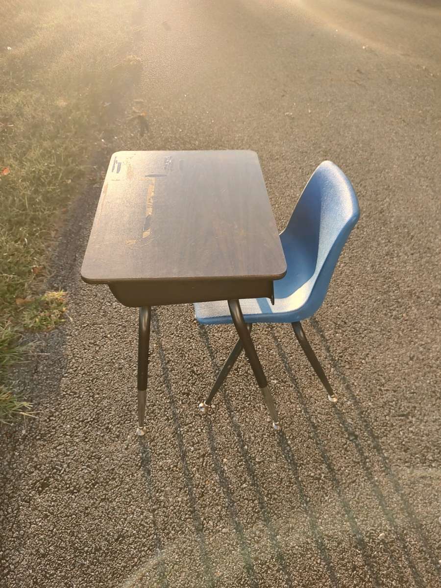 student desk with a chair or a end table